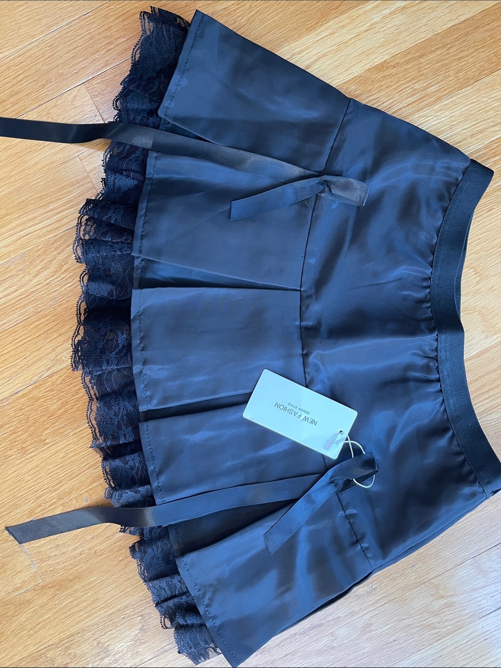 Black Satin Mini Skirt with Lace Trim